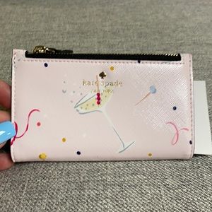 Kate Spade “Mikey” dashing beauty wallet